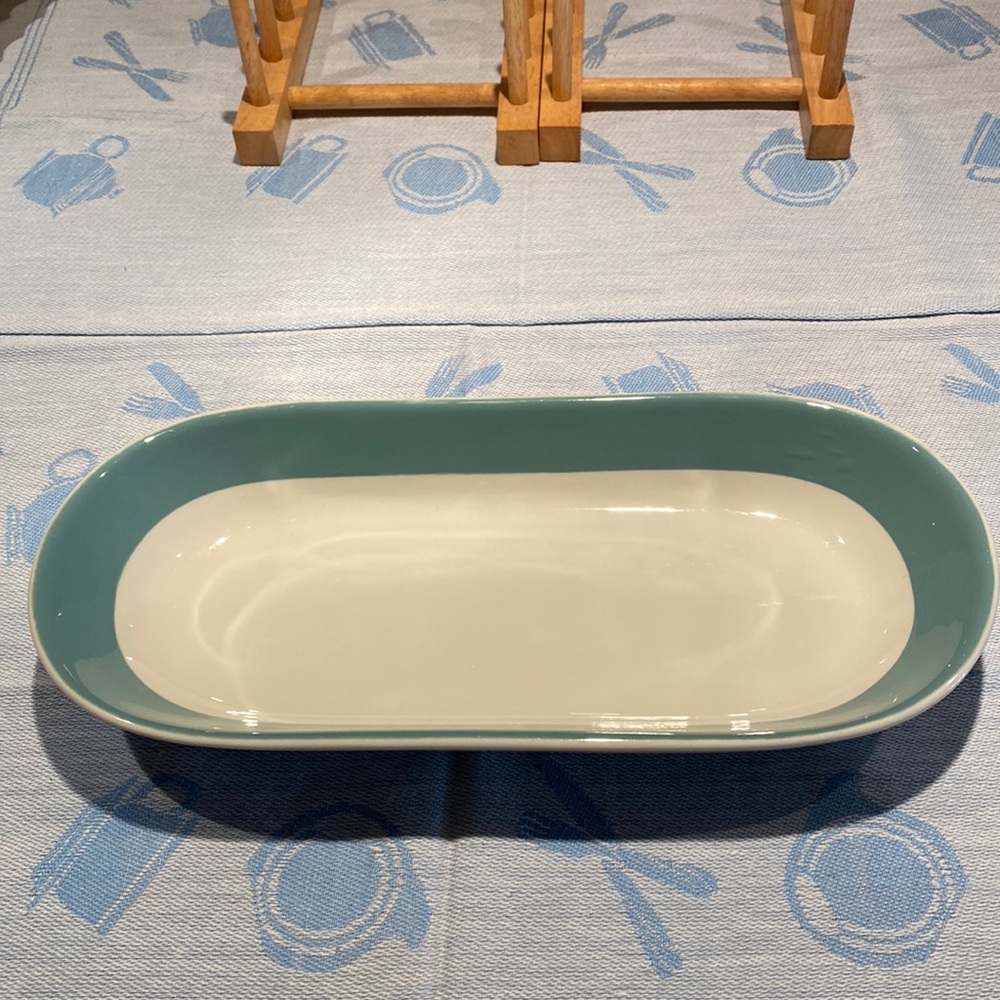 12 inch by 5 3/4 inch China tray. 2 inches deep. White with turquoise accent.